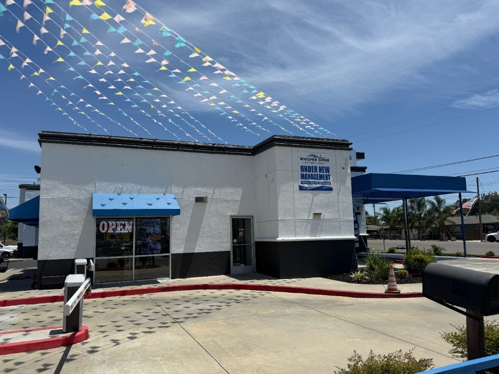 Whisper Shine Express Wash building exterior under new management